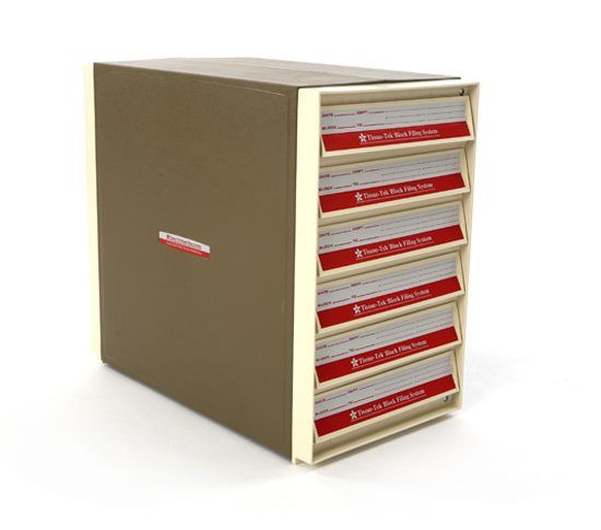 A beige file box with six labeled drawers containing Texas Instruments Trillion File file cards, used for data storage and organization.