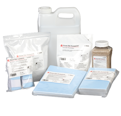 A collection of medical supplies in various packaging, including bottles, jars, pouches, and stackable blue pads, displayed on a plain background.
