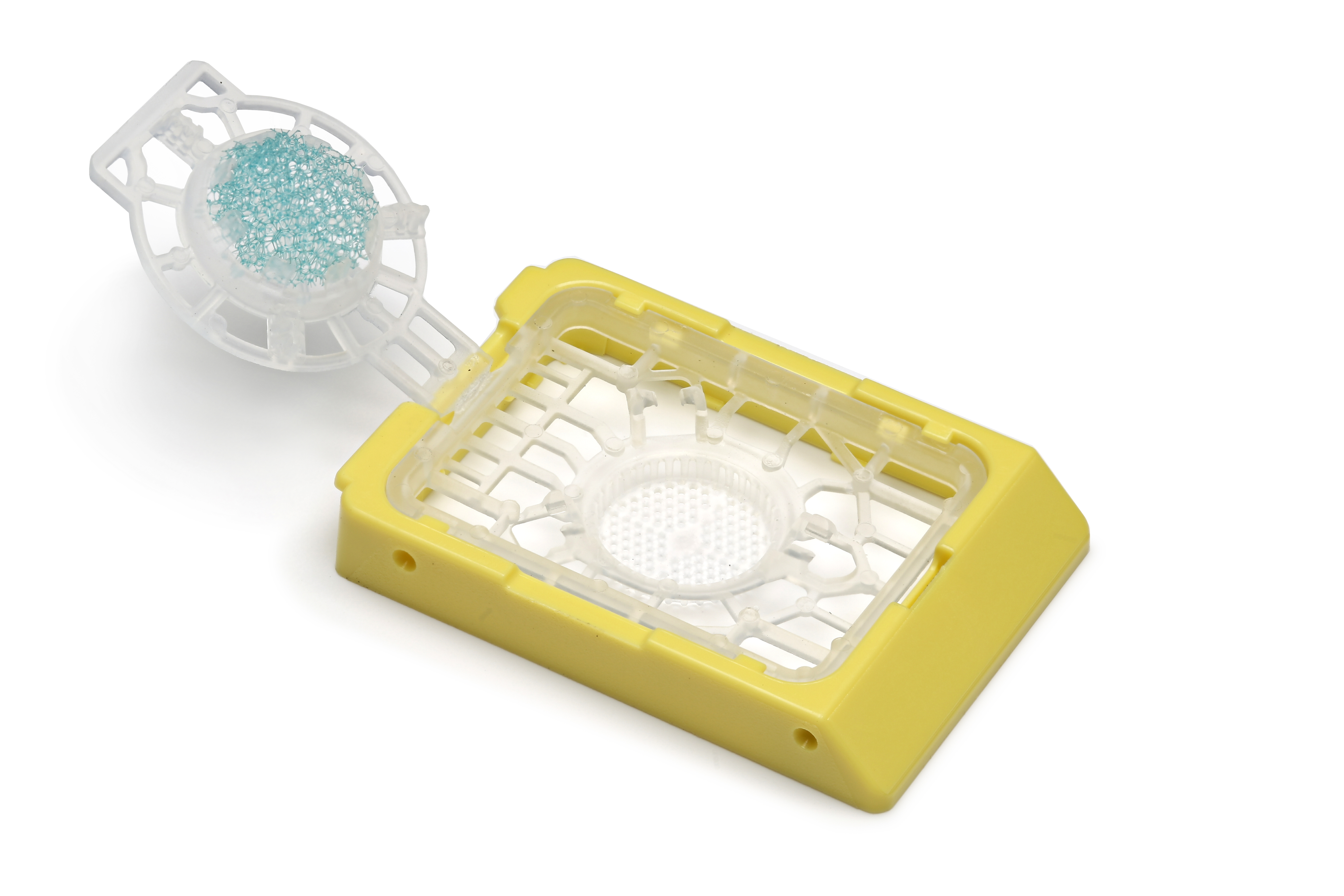 A yellow rectangular plastic container with a hinged lid, featuring a small compartment with light blue granules inside.