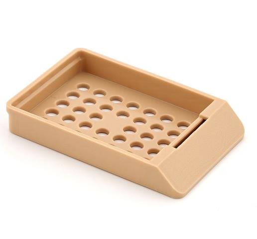 A plastic container with holes.