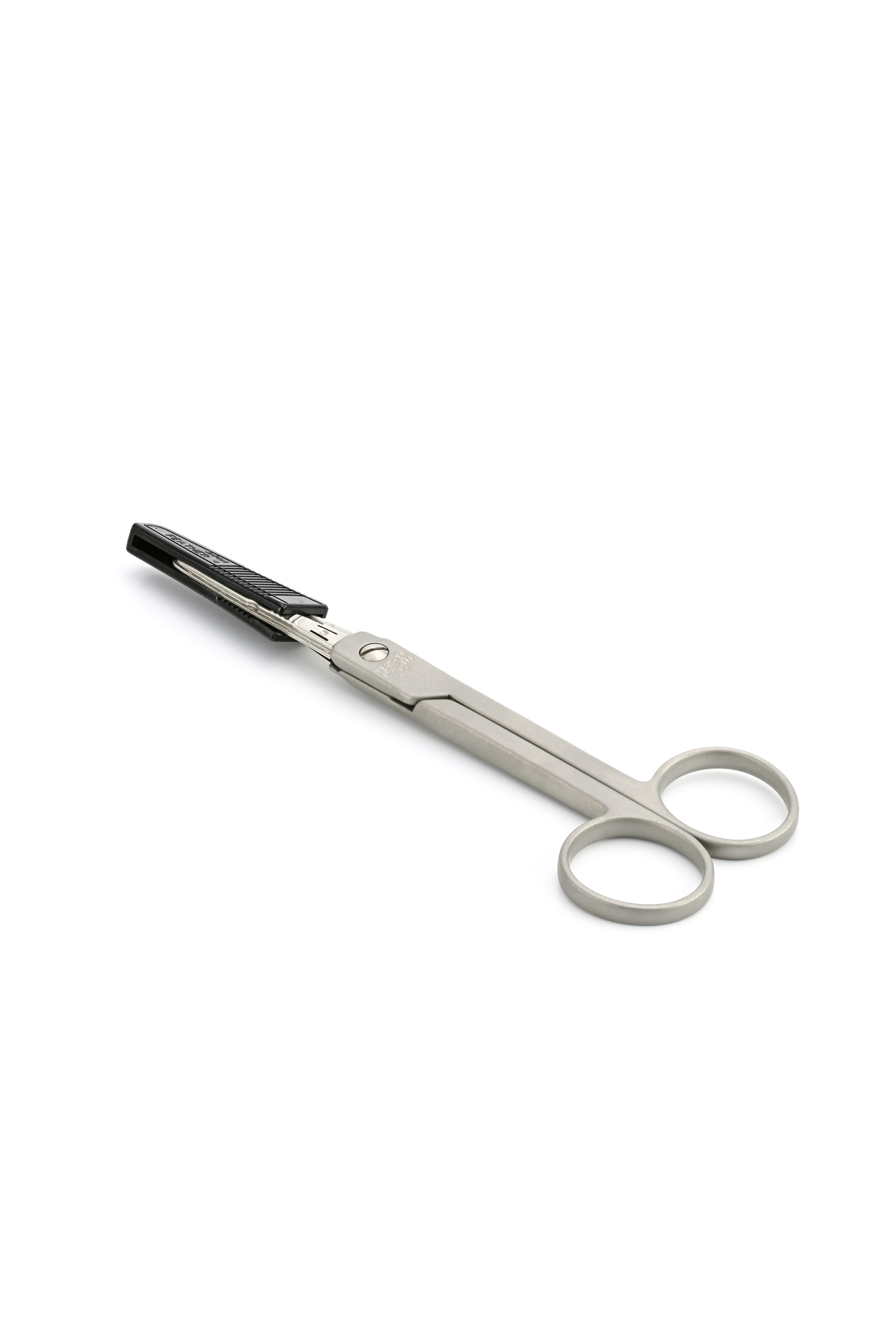 A pair of metal bandage scissors with angled blades and a blunt tip, positioned on a white background.