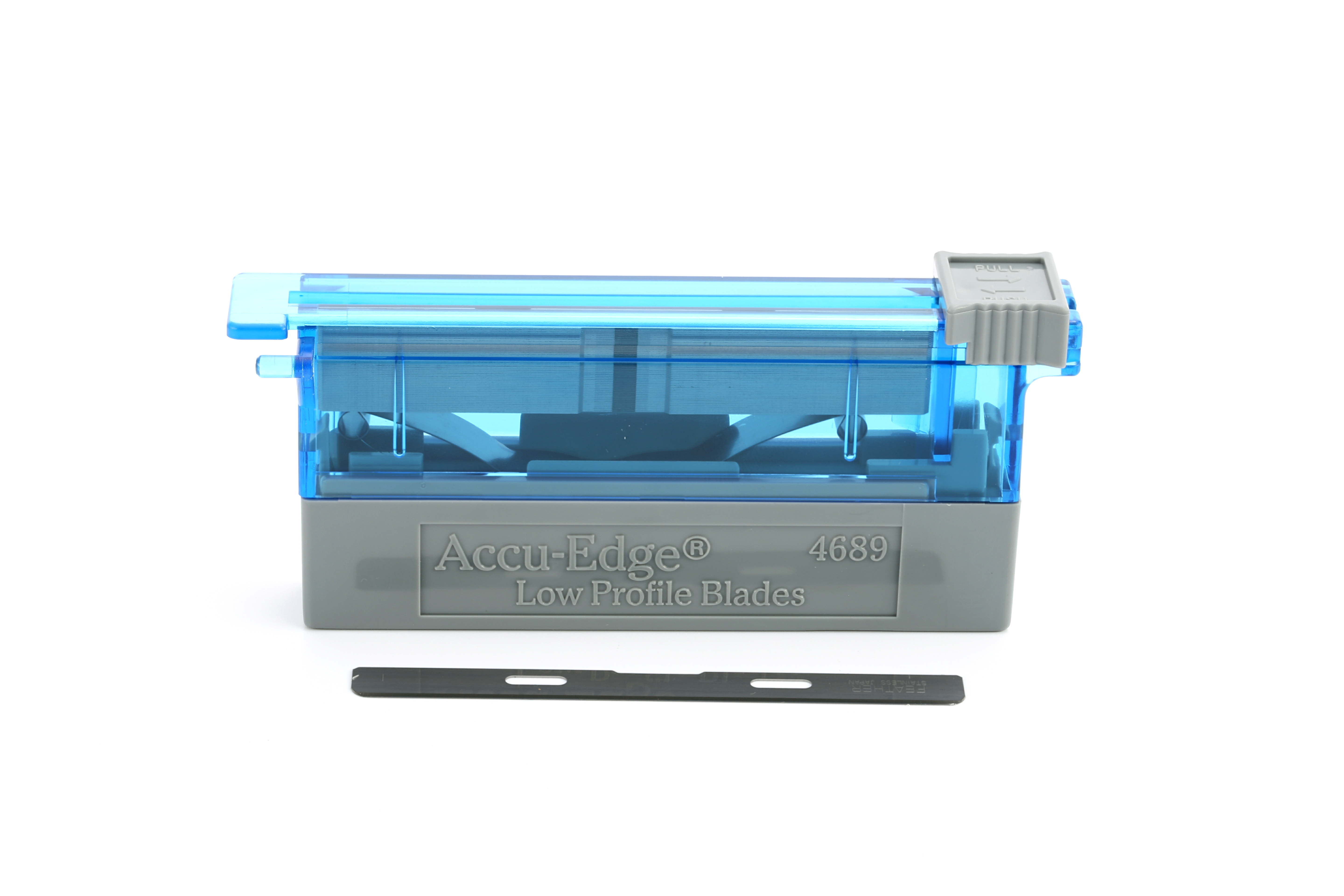 A blue and gray Accu-Edge 4689 low profile blade dispenser with a single black blade placed in front of it on a white background.