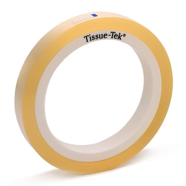 A roll of yellow Tissue-Tek tape with the brand name printed on the white inner edge, positioned upright on a white background.