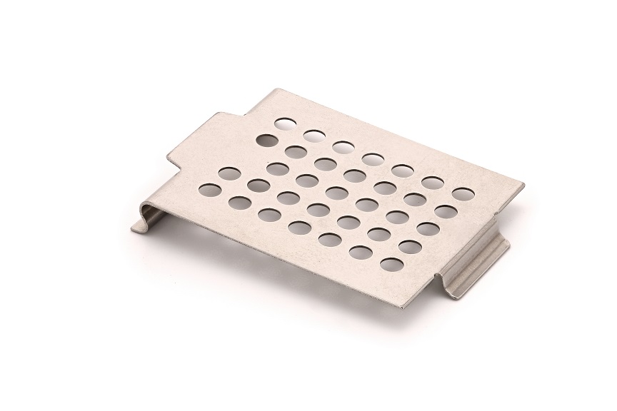 A rectangular metal plate with evenly spaced circular holes and bent edges, placed on a white background.
