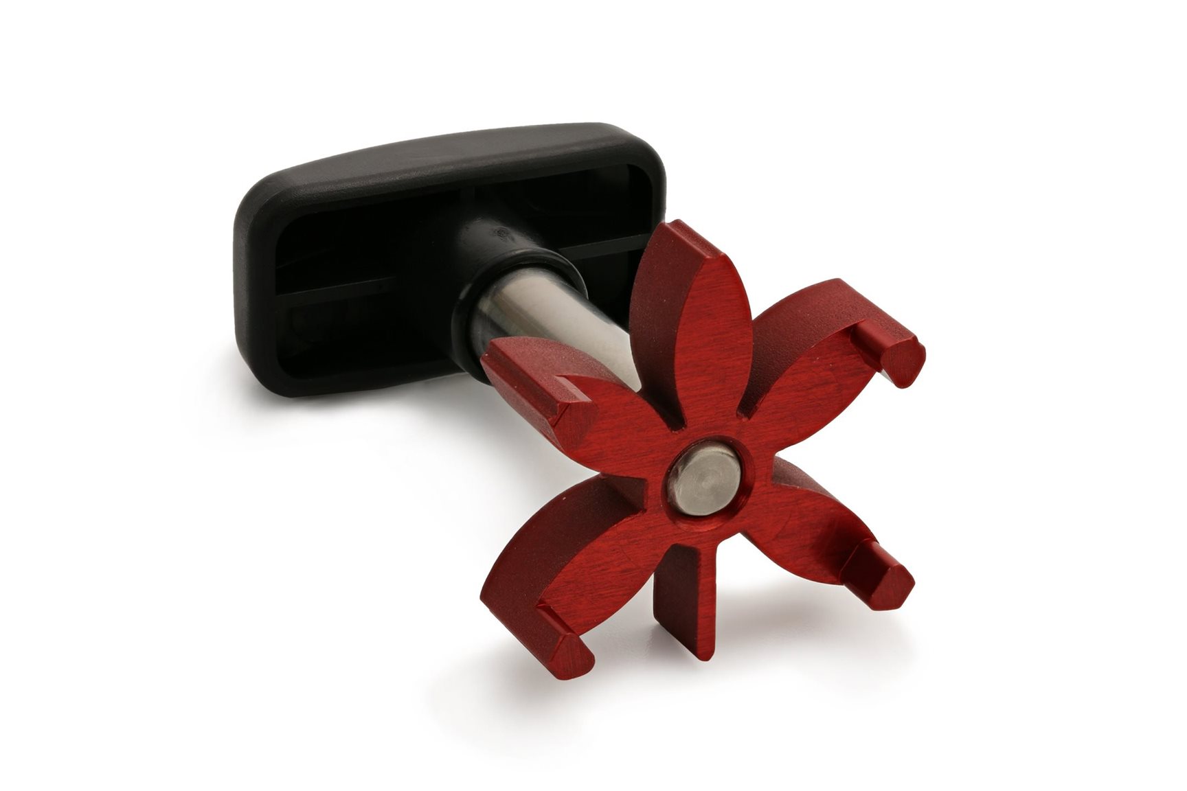 A metal and plastic tool with a black handle and a red, flower-shaped attachment featuring six open-ended petals.