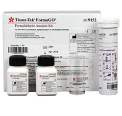 Tissue-Tek FormaGO Formaldehyde Analysis Kit including two reagent bottles, a clear container, an instruction tube, and a labeled box in the background.