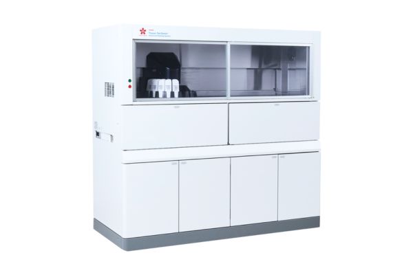 Automated laboratory machine with a glass-front upper compartment and lower storage cabinets, shown on a plain white background.