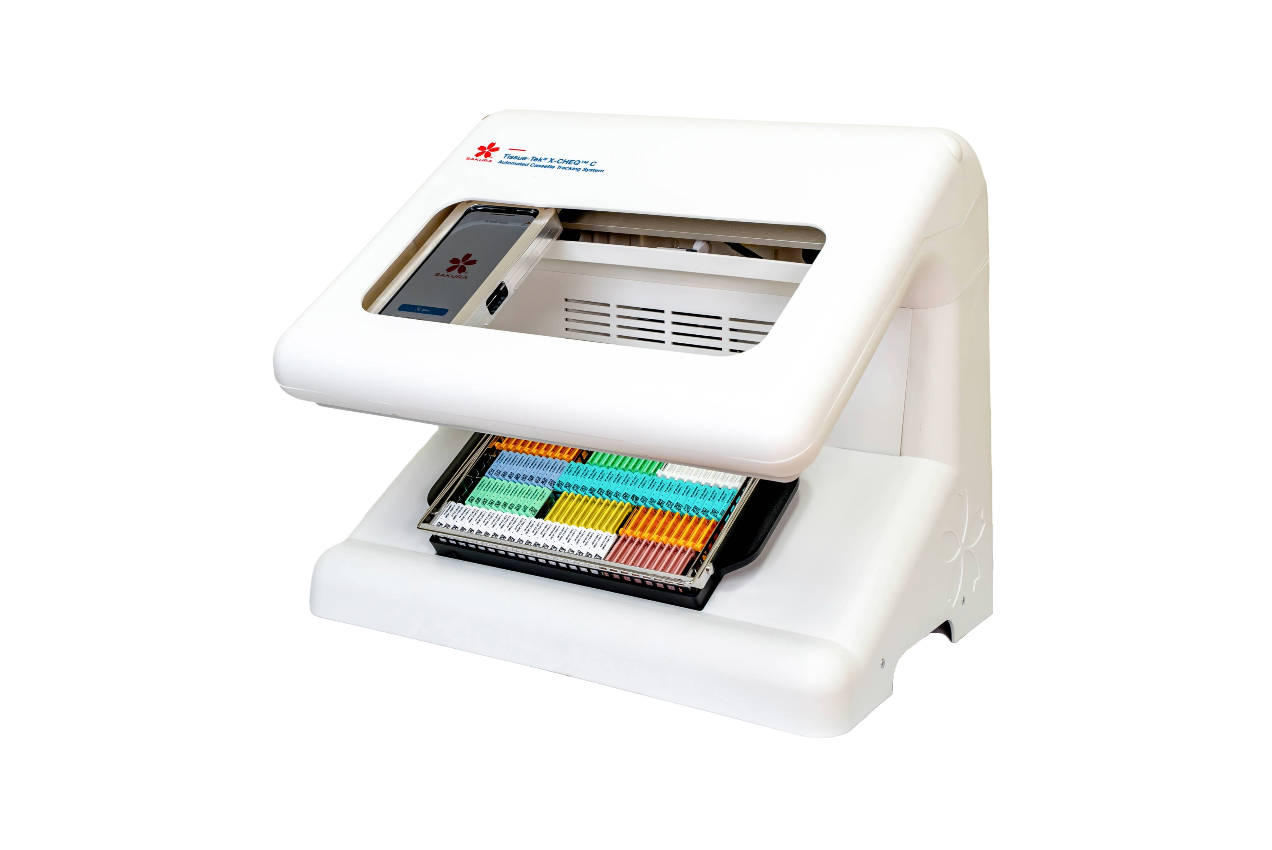 A laboratory device with a transparent lid showing multi-colored sample tubes organized in rows inside a tray.