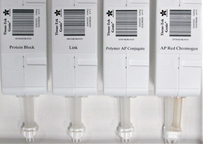 Several white containers with black labels.