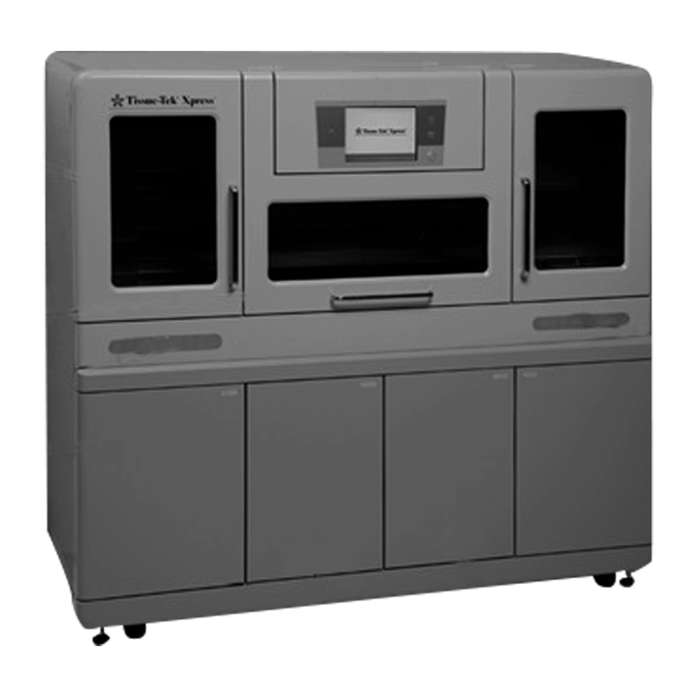 A large, gray Trans-Tek Xpress industrial machine with cabinets, a display screen, and multiple compartments, positioned on wheels.